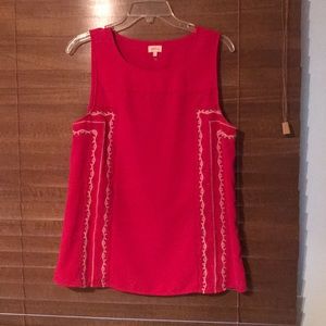 Pink tank with white detail on side